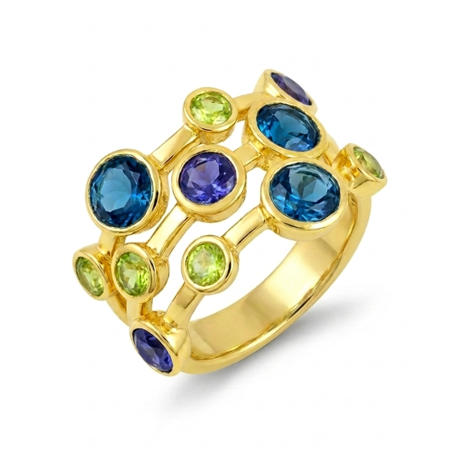 Gold ring with blue and green gemstones on a white background